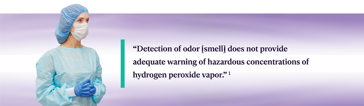 Female healthcare worker wearing a gown, cap, gloves, and mask